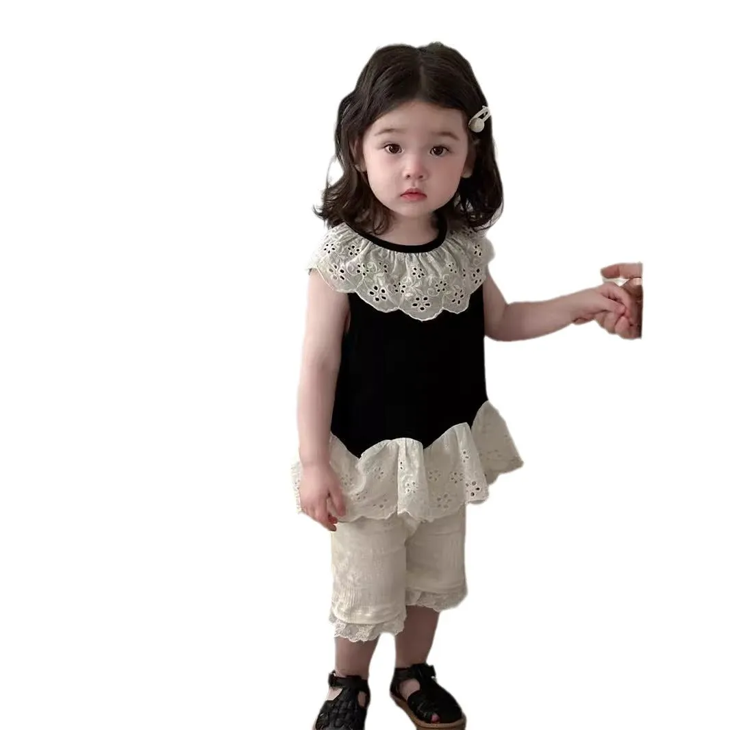 Girls cotton ruffled short sleeve blouse and shorts two-piece suit in apricot with cartoon flower print