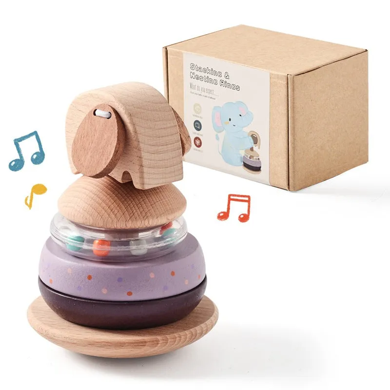 Wooden baby stacking post set with colourful shapes on a central post, packed in a cowhide box