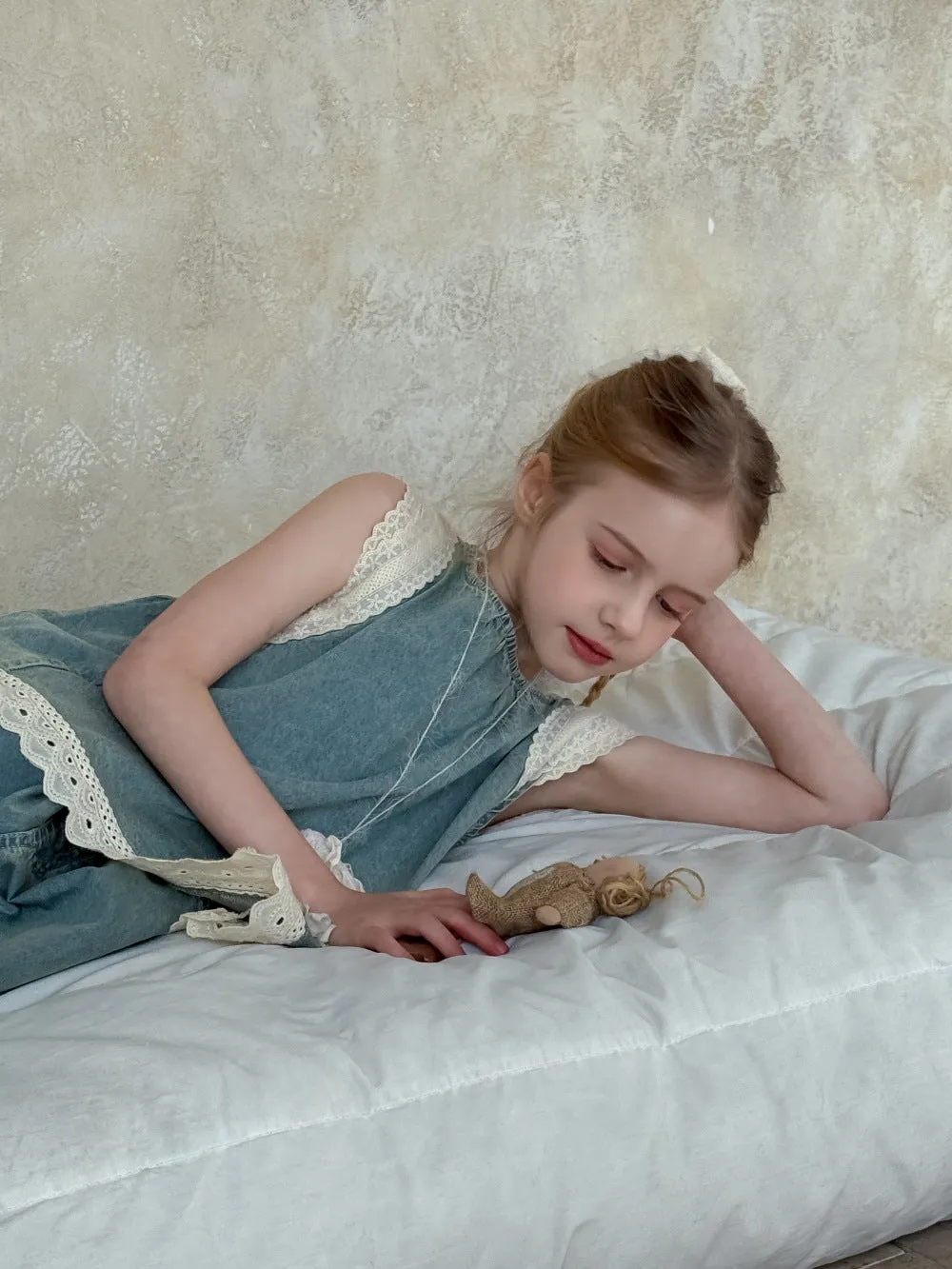 Light blue girls' lace trim denim cropped wide-leg pants and sleeveless vest two-piece set on child model