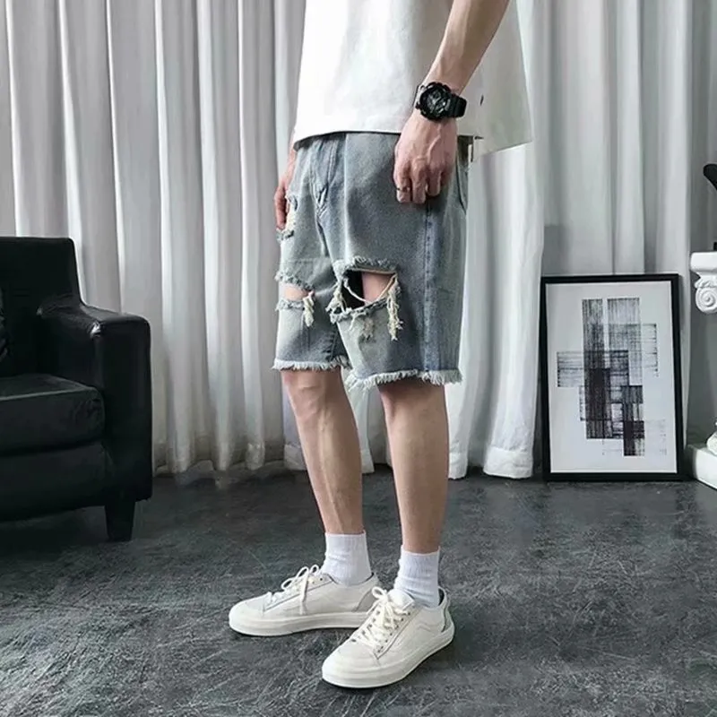 Men's thin ripped denim shorts in retro colour with handmade distressing, Bermuda length, size L