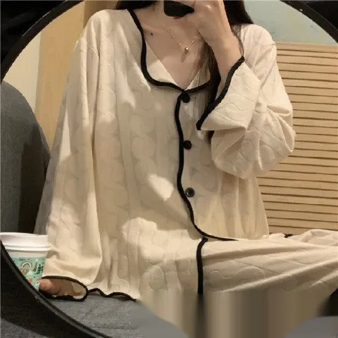 Sweet And Simple Cardigan Pajamas in cloud cotton with cartoon print, long sleeves, and matching trousers