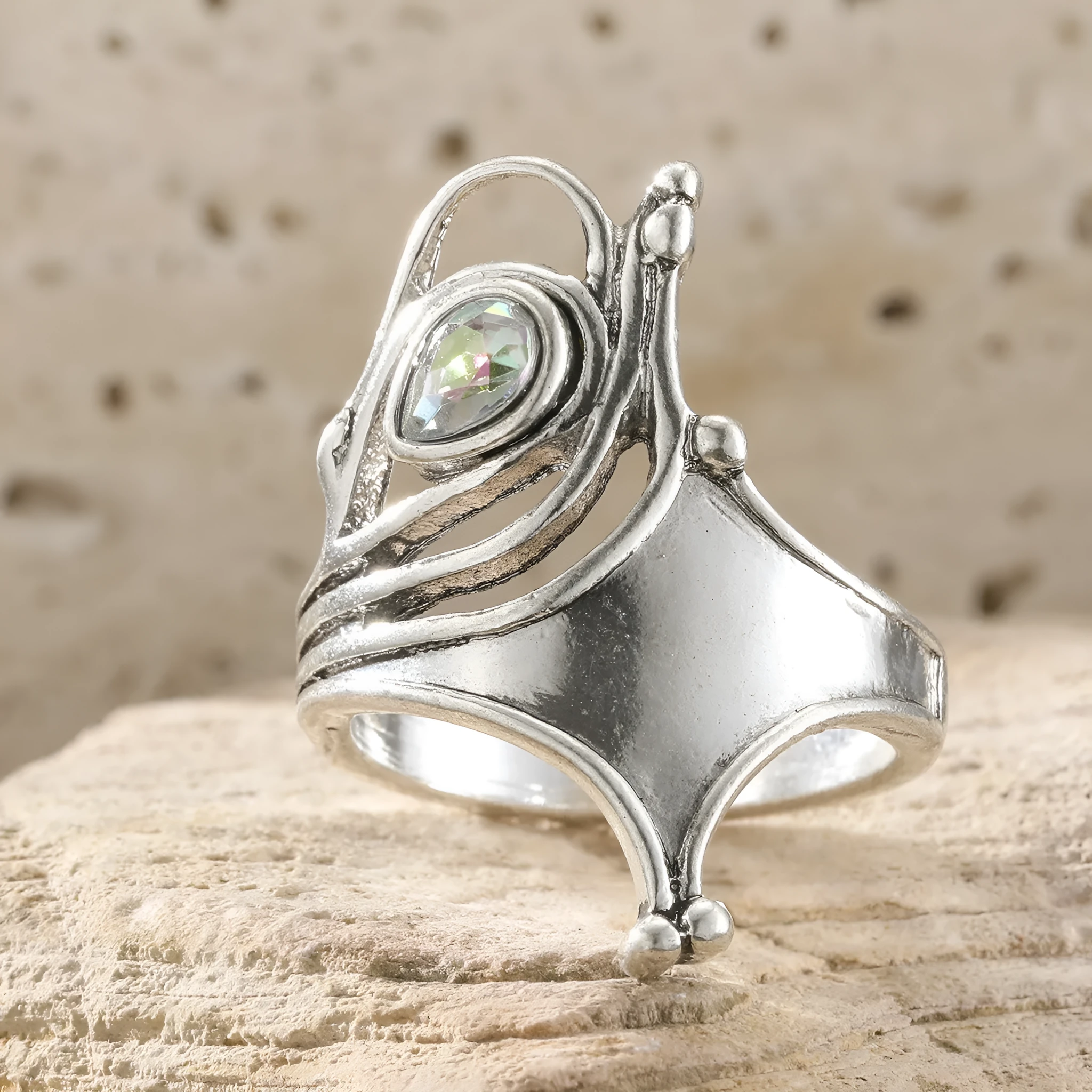 Retro wide hollow ring for women in silver zinc alloy electroplated finish on white background