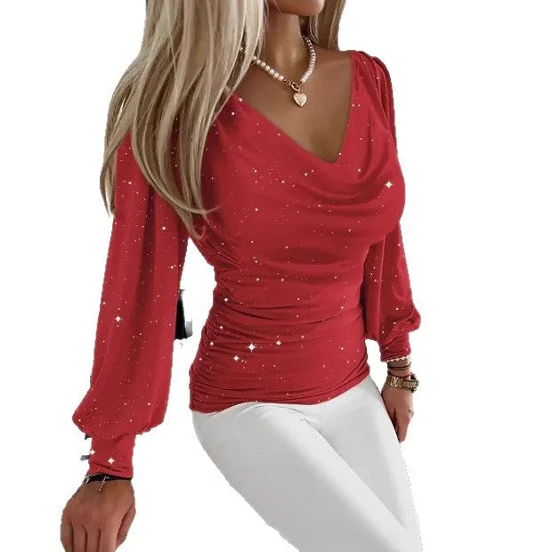 Women's red polyester draped neck top with flared long sleeves and sequin detail on a hanger