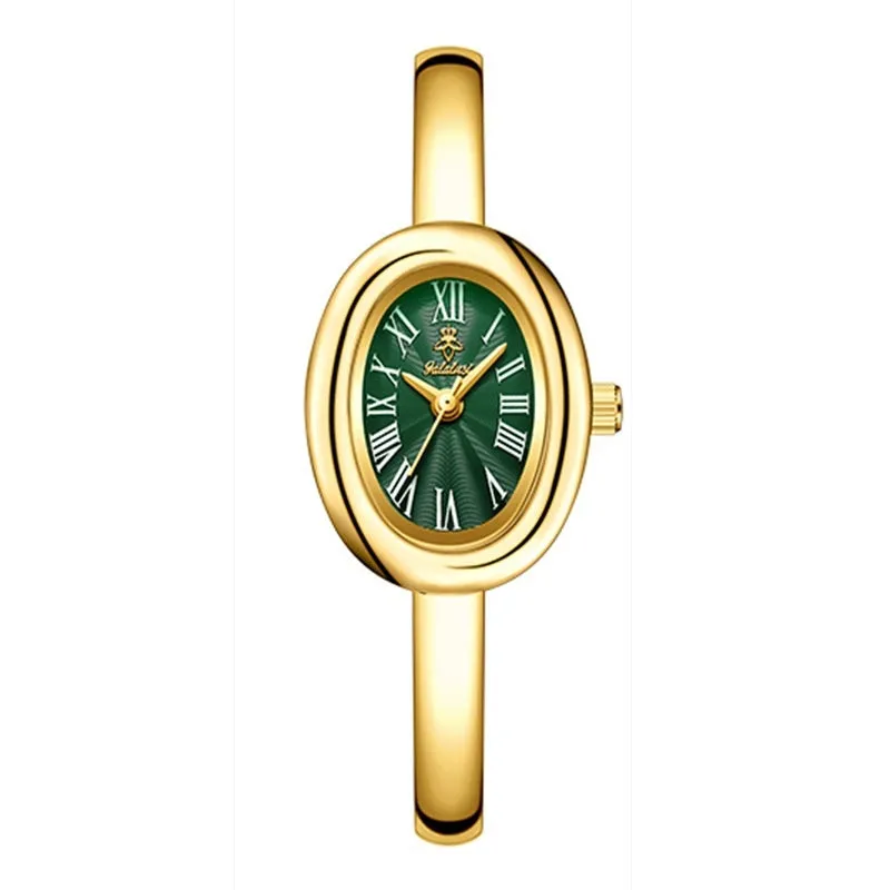 Women's gold and silver oval retro quartz watch with spiral patterns on a 8mm thick case.