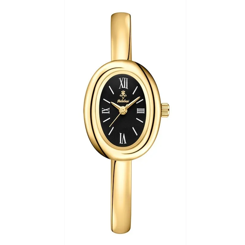 Women's gold and silver oval retro quartz watch with spiral patterns on a 8mm thick case.