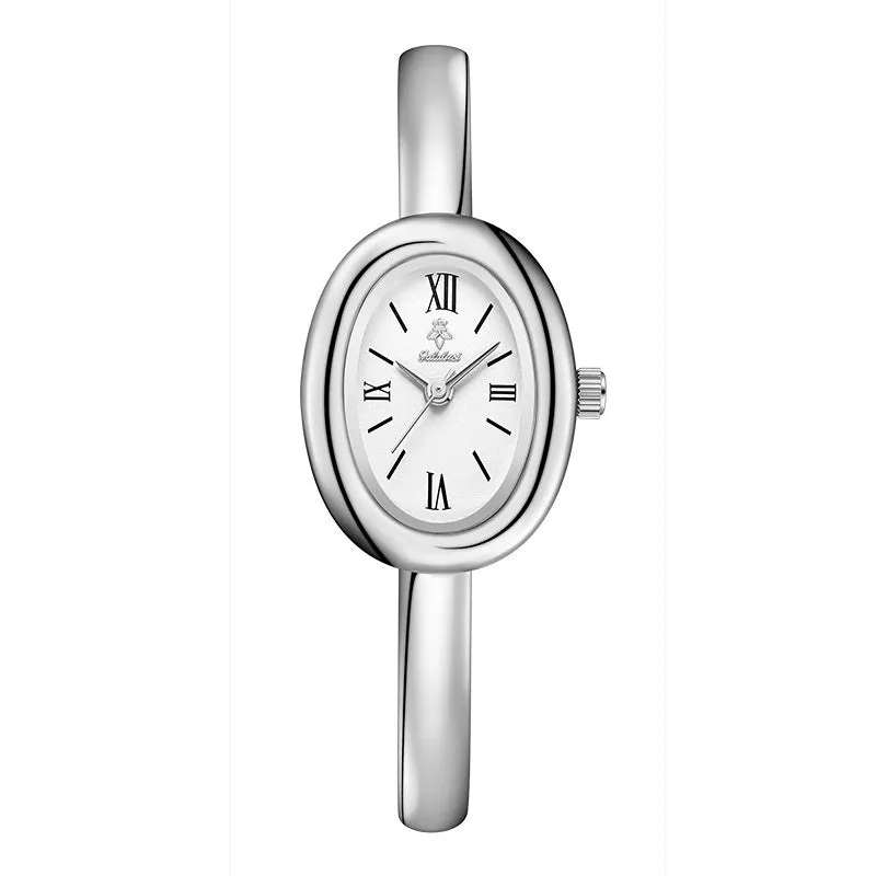 Women's gold and silver oval retro quartz watch with spiral patterns on a 8mm thick case.