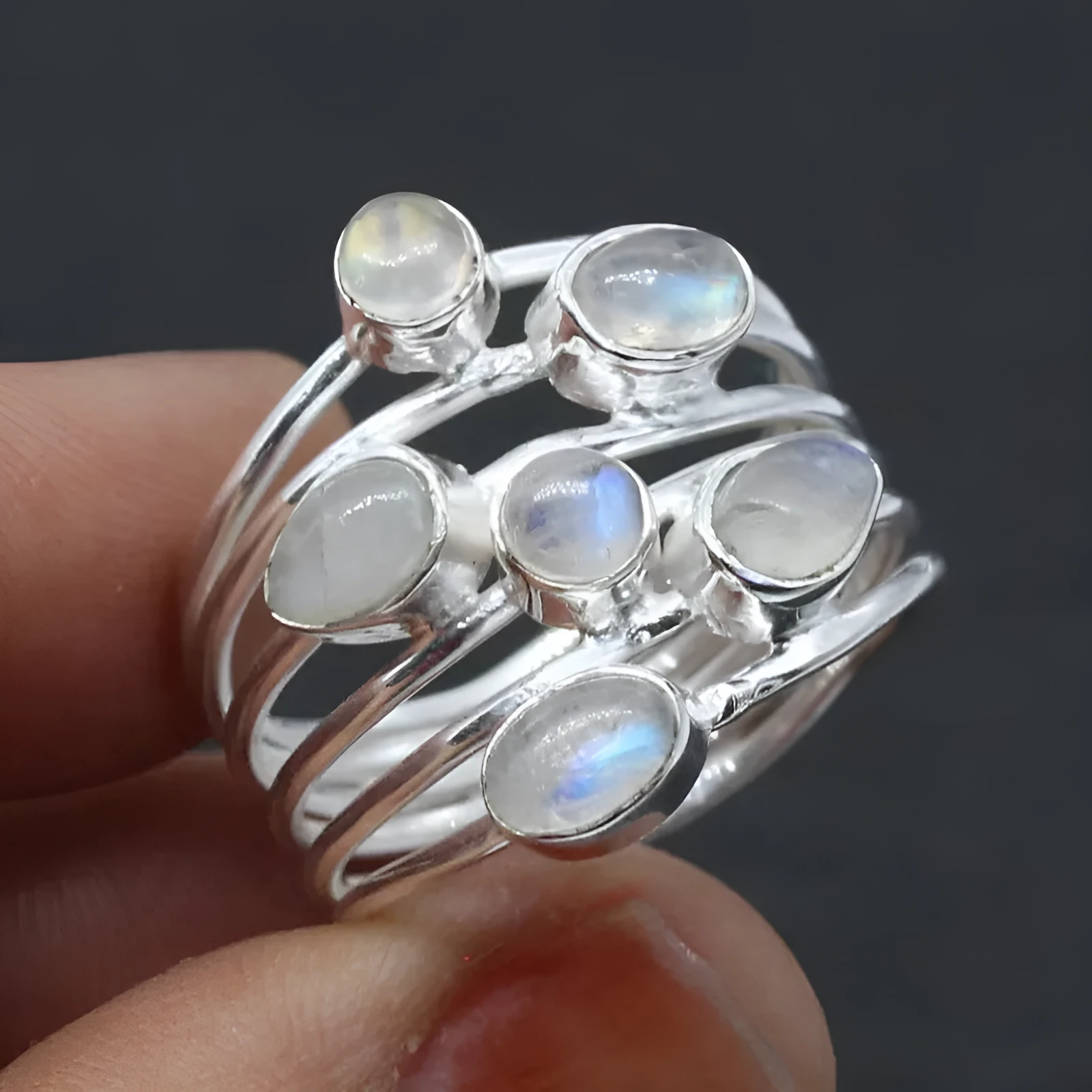 Silver irregular wide band ring for women made of zinc alloy on plain background showing full shape