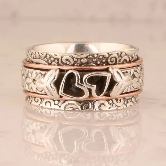 Silver women's personality love wide noodle ring on white background, size option visible