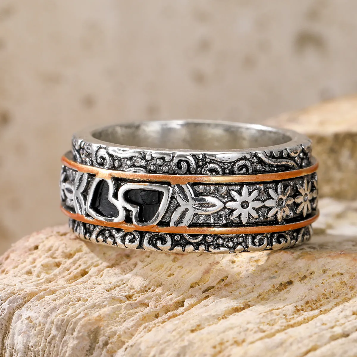 Silver women's personality love wide noodle ring on white background, size option visible