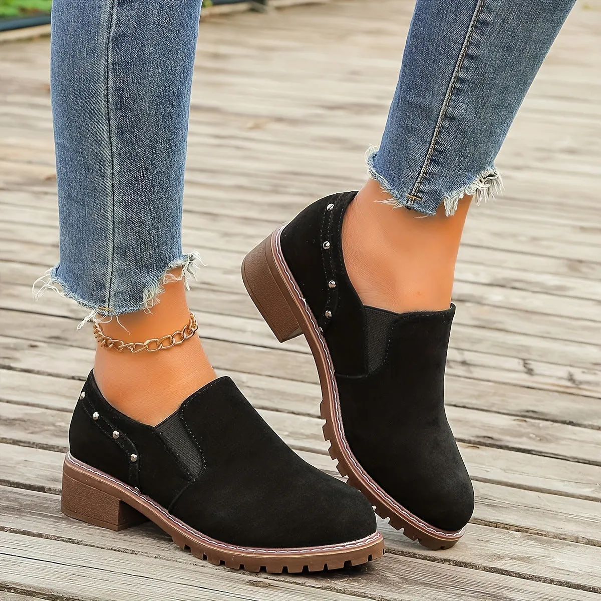 Plus size women's ankle boots in black suede with thick low heel and elastic band
