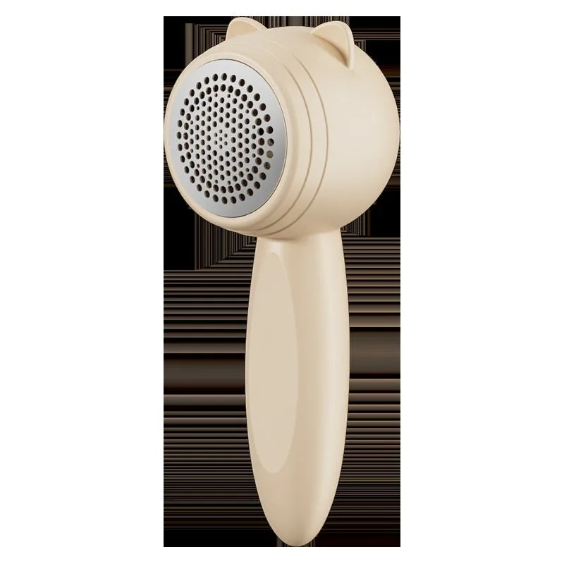 Small cat portable rechargeable hair remover in cream colour for removing lint and pet hair from clothes