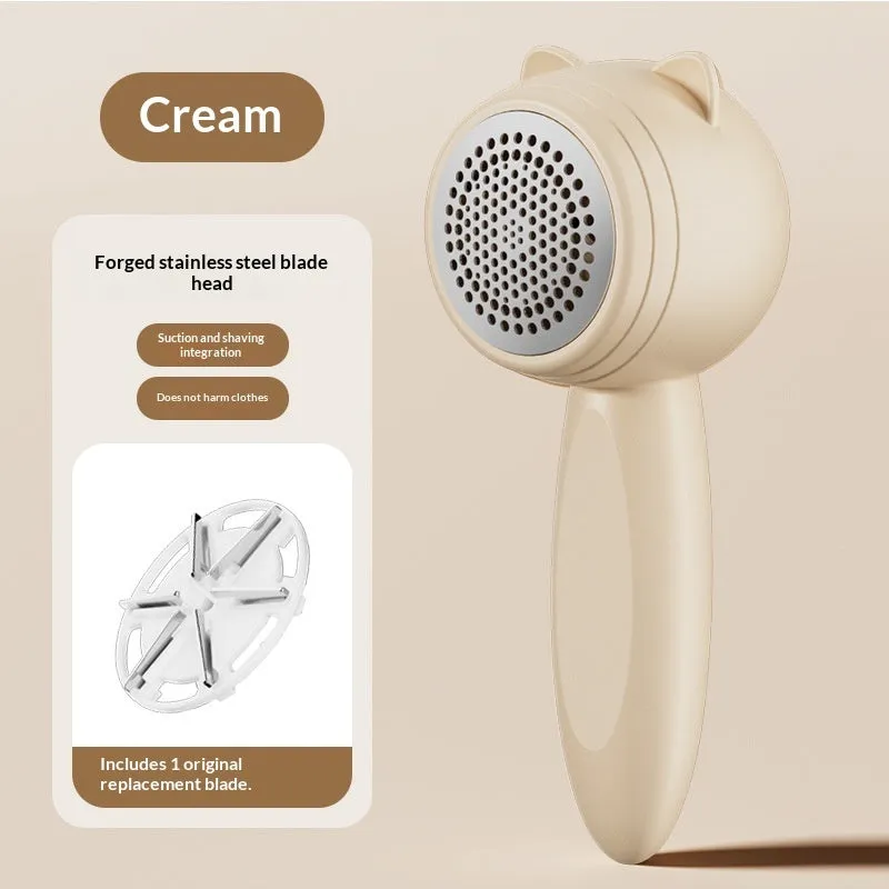 Small cat portable rechargeable hair remover in cream colour for removing lint and pet hair from clothes