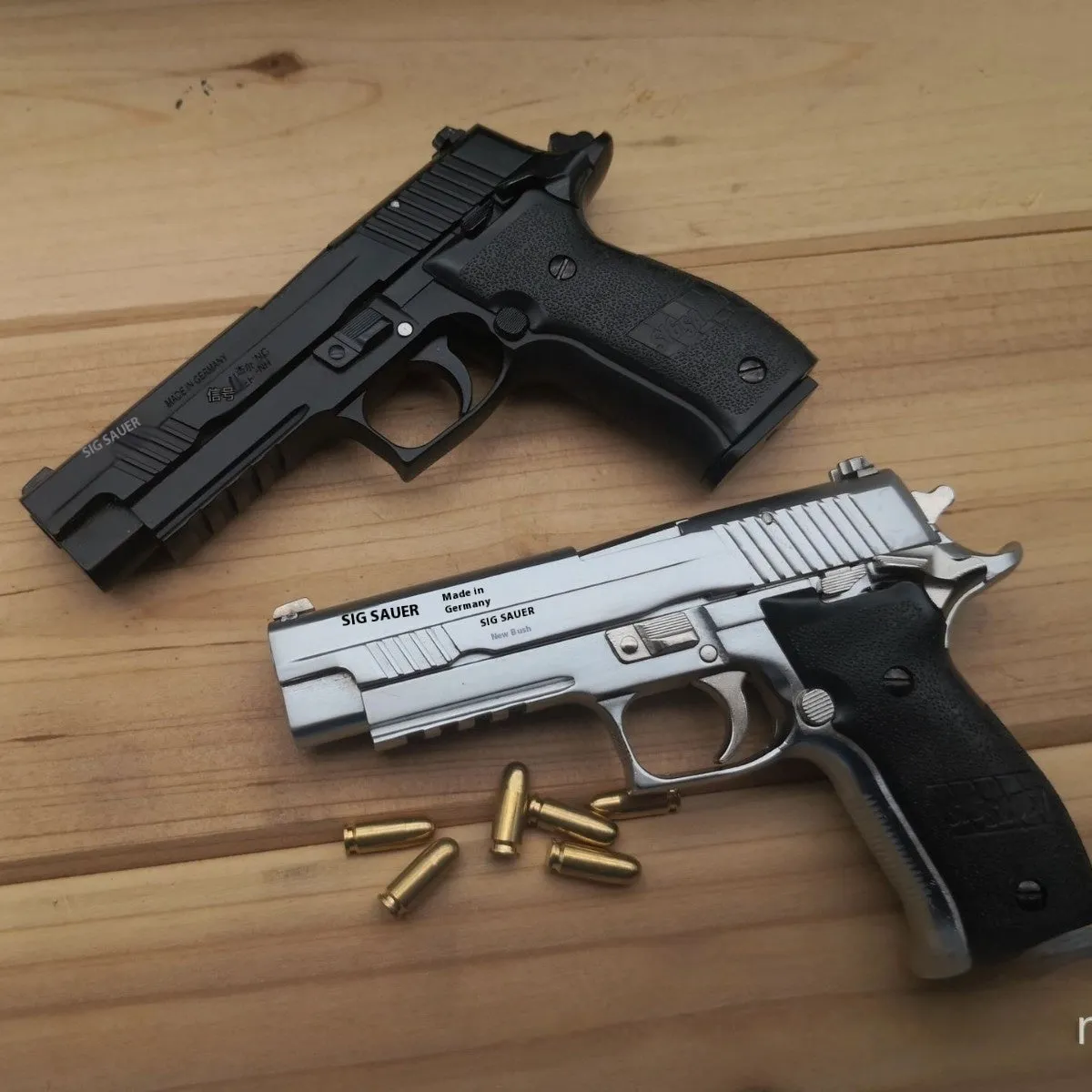 Alloy Empire Sigsauer P226 model toy gun in black metal finish on display stand