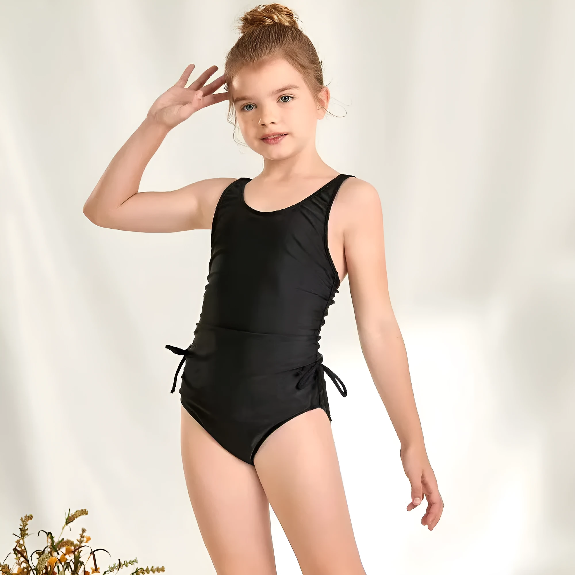 Children's solid black pleated tie swimsuit briefs in polyester spandex for swimming and wading