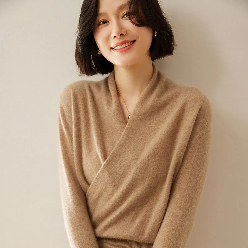 Women's solid colour cashmere V-neck cross sweater top with long sleeves in Elegant Camel, shown on a model.