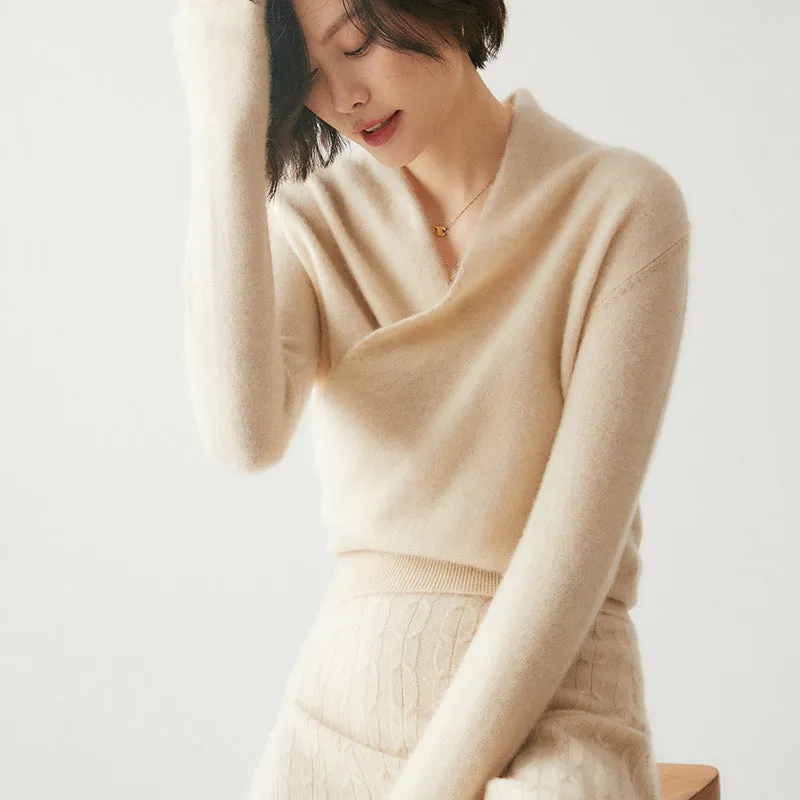 Women's solid colour cashmere V-neck cross sweater top with long sleeves in Elegant Camel, shown on a model.