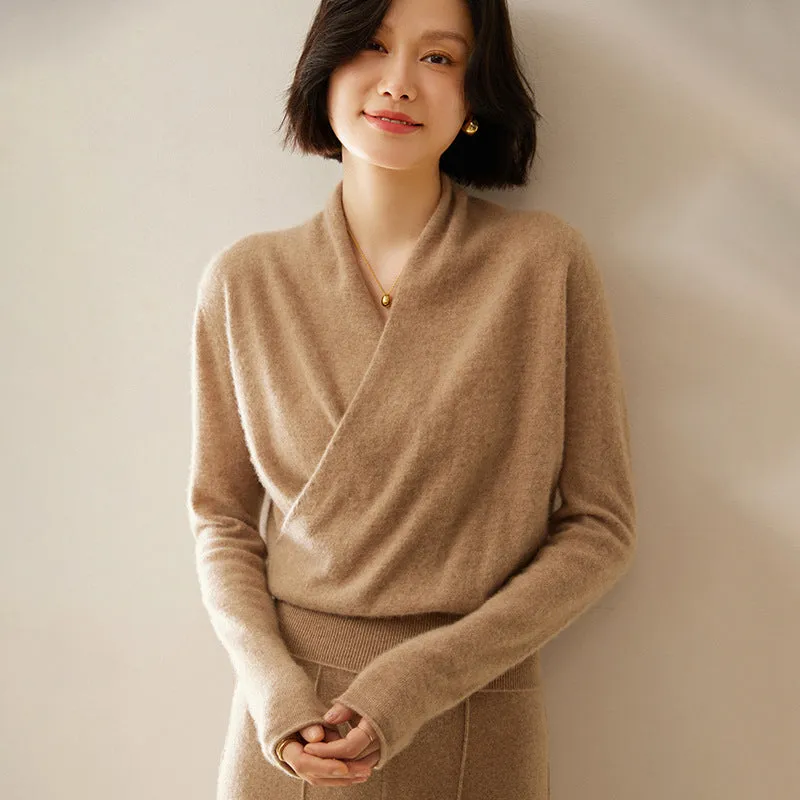 Women's solid colour cashmere V-neck cross sweater top with long sleeves in Elegant Camel, shown on a model.