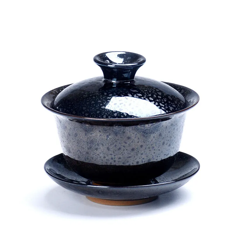 Handcrafted ceramic three-piece tea set with covered bowl and teacup in transmutation glaze finish