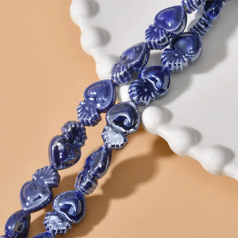 Ceramic love heart small torch shaped beads in various colours with straight holes for jewellery making
