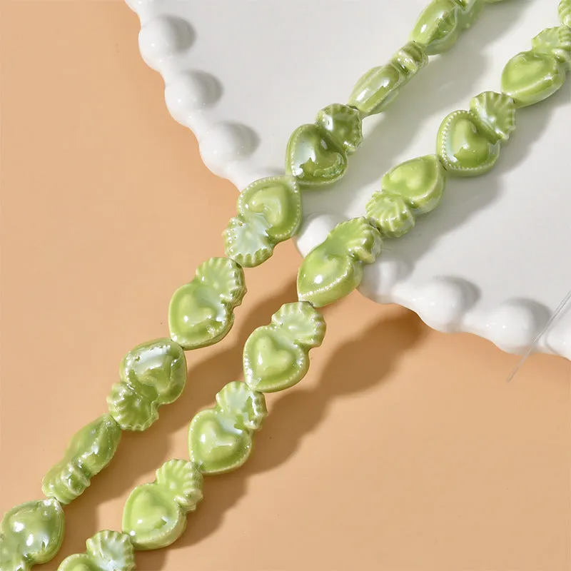 Ceramic love heart small torch shaped beads in various colours with straight holes for jewellery making