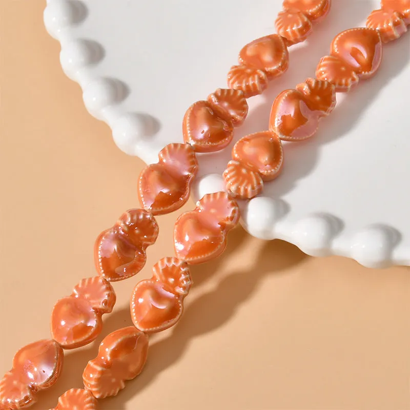Ceramic love heart small torch shaped beads in various colours with straight holes for jewellery making