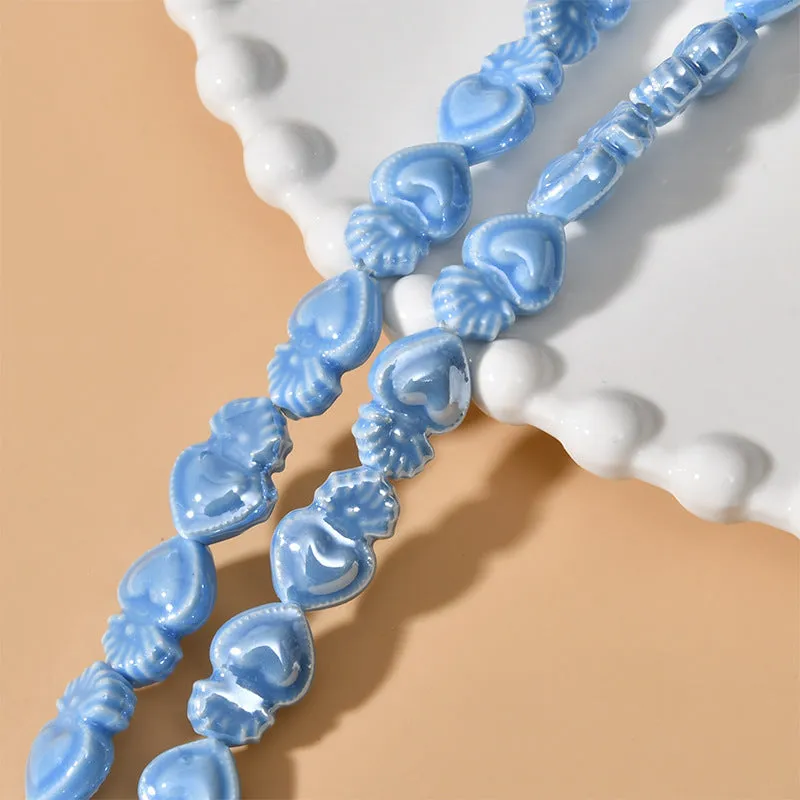 Ceramic love heart small torch shaped beads in various colours with straight holes for jewellery making