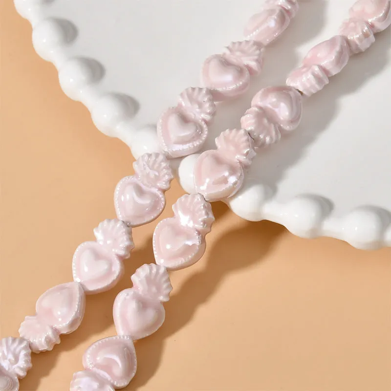 Ceramic love heart small torch shaped beads in various colours with straight holes for jewellery making