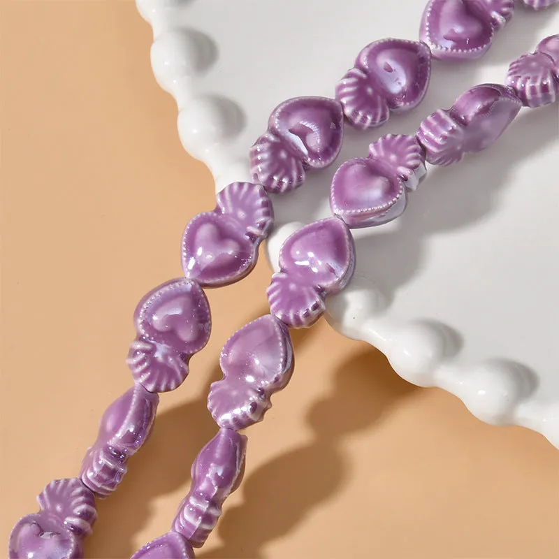 Ceramic love heart small torch shaped beads in various colours with straight holes for jewellery making