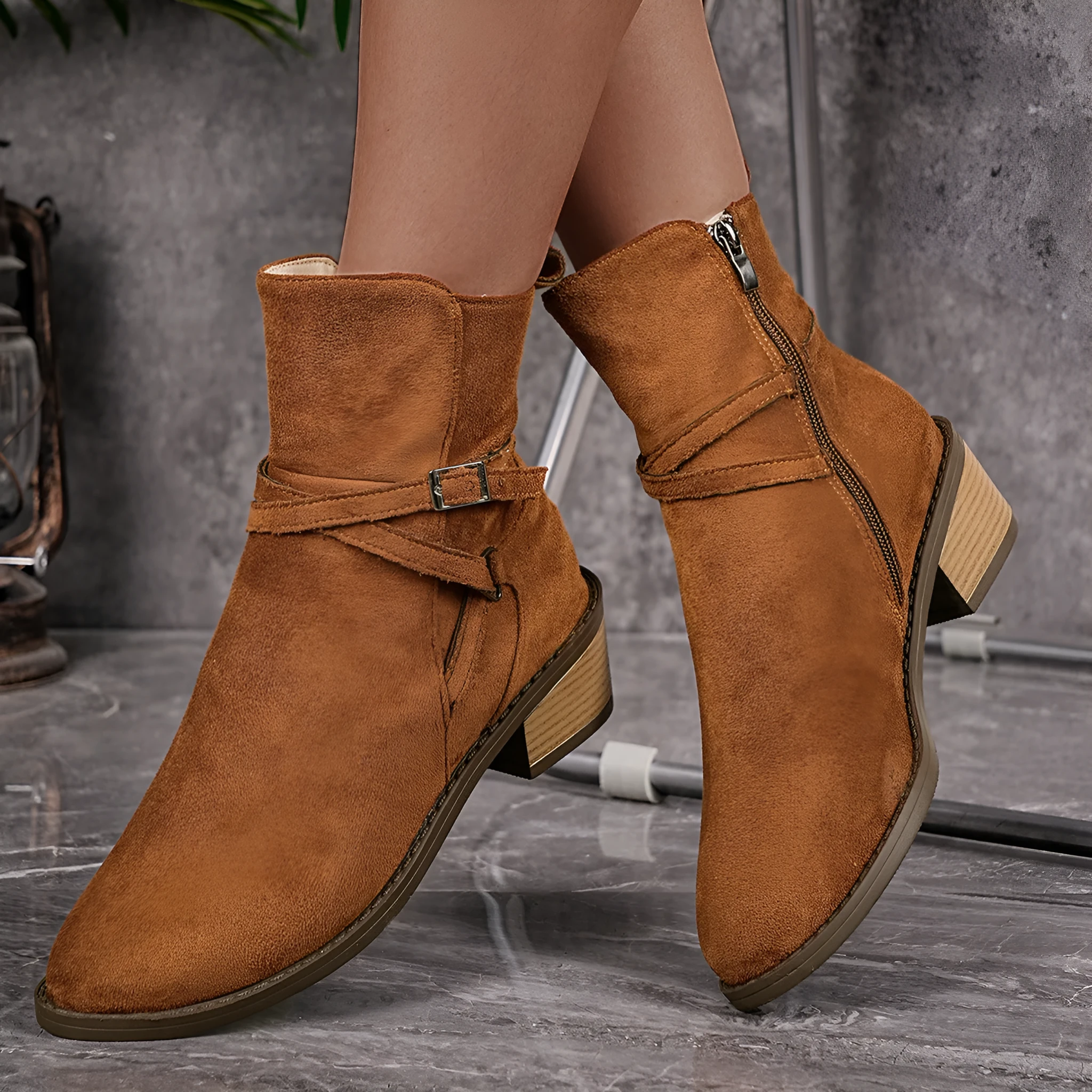 Women's suede mid-heel ankle boots with cross-strap, side zipper, square heel, round toe, black colour option.