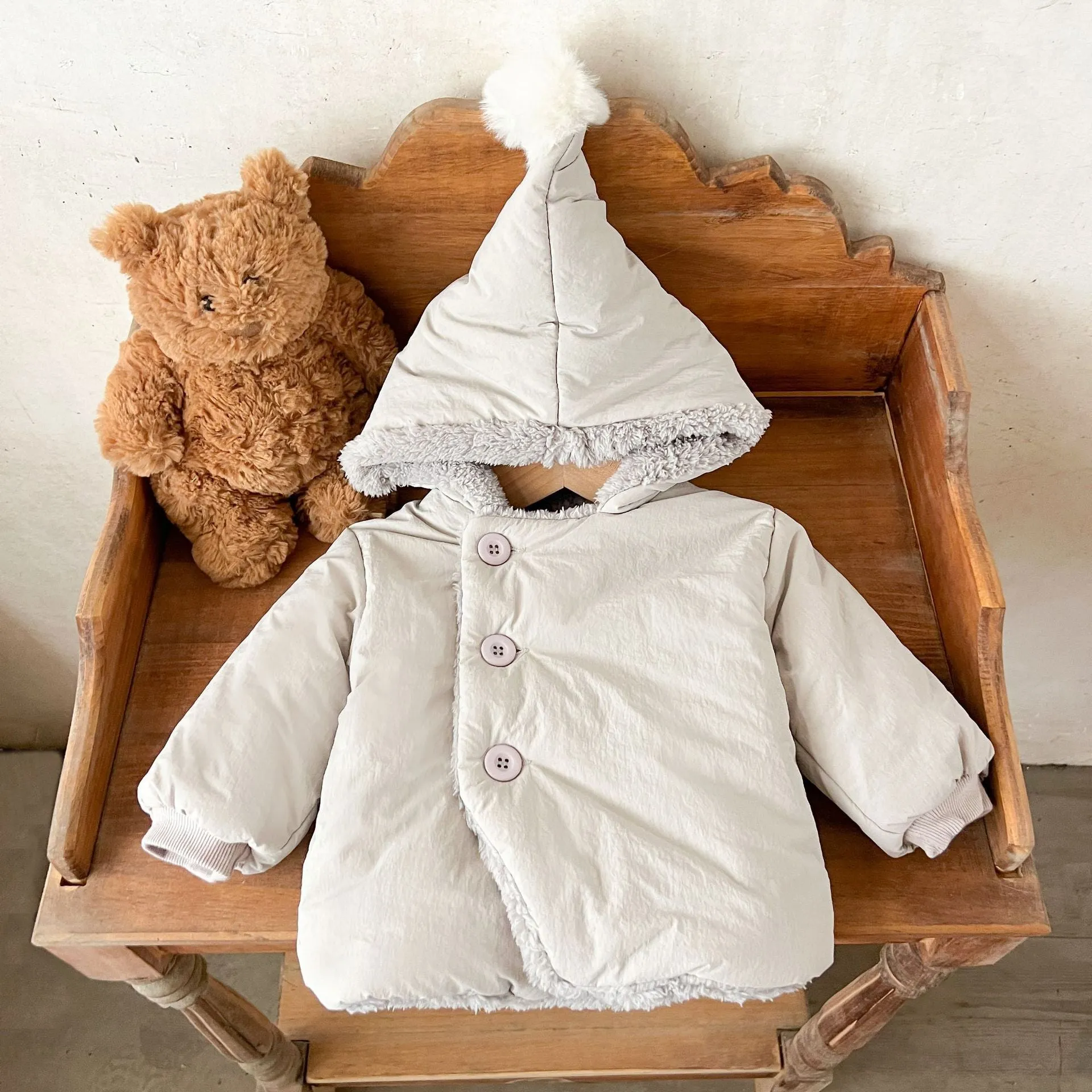 Winter fleece-lined unisex baby jacket in solid colour, pearl fleece fabric, hooded, button front, available in light gray, pink, brown, bright red