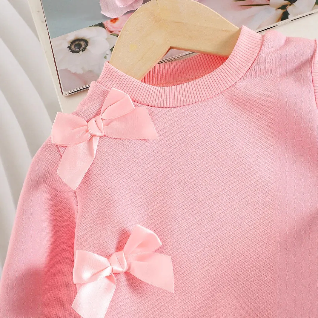 Pink two-piece baby girls outfit with long-sleeved sweater and trousers in cotton
