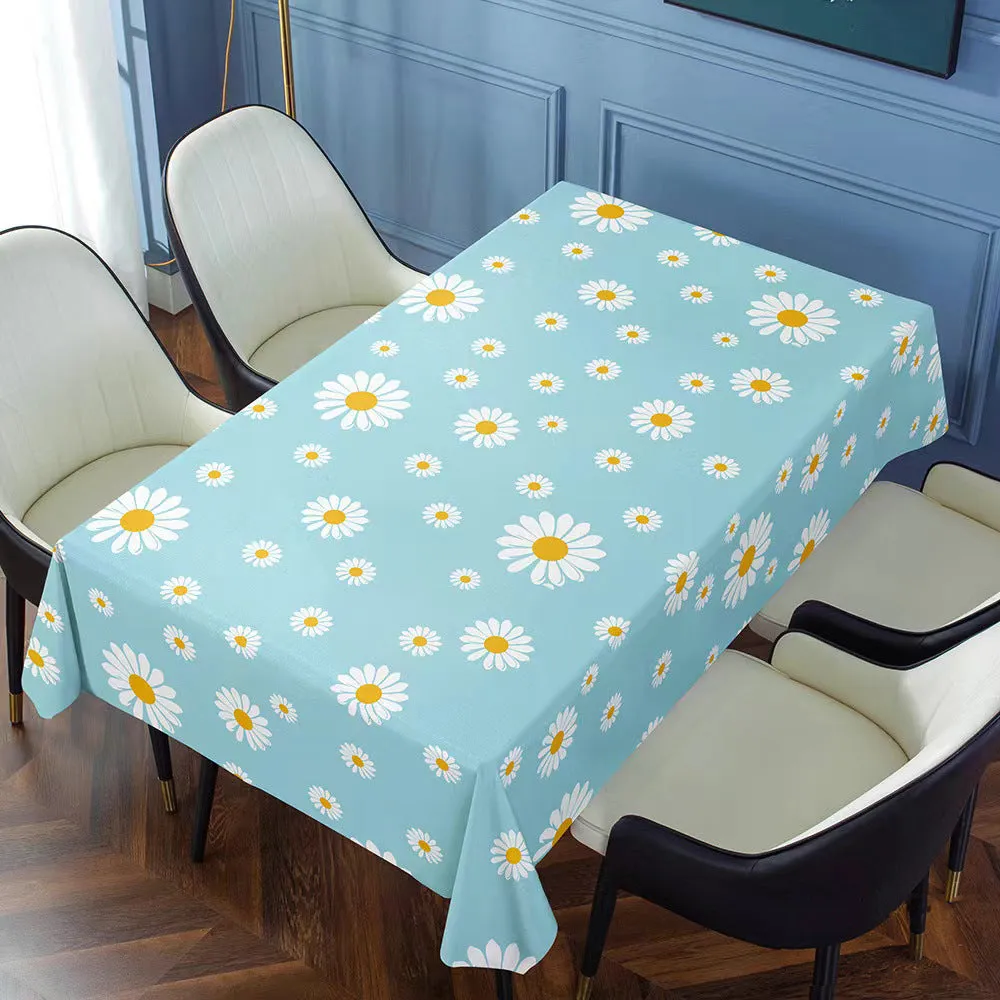 Rectangular PVC tablecloth with non-slip backing on a coffee table, showing geometric pattern