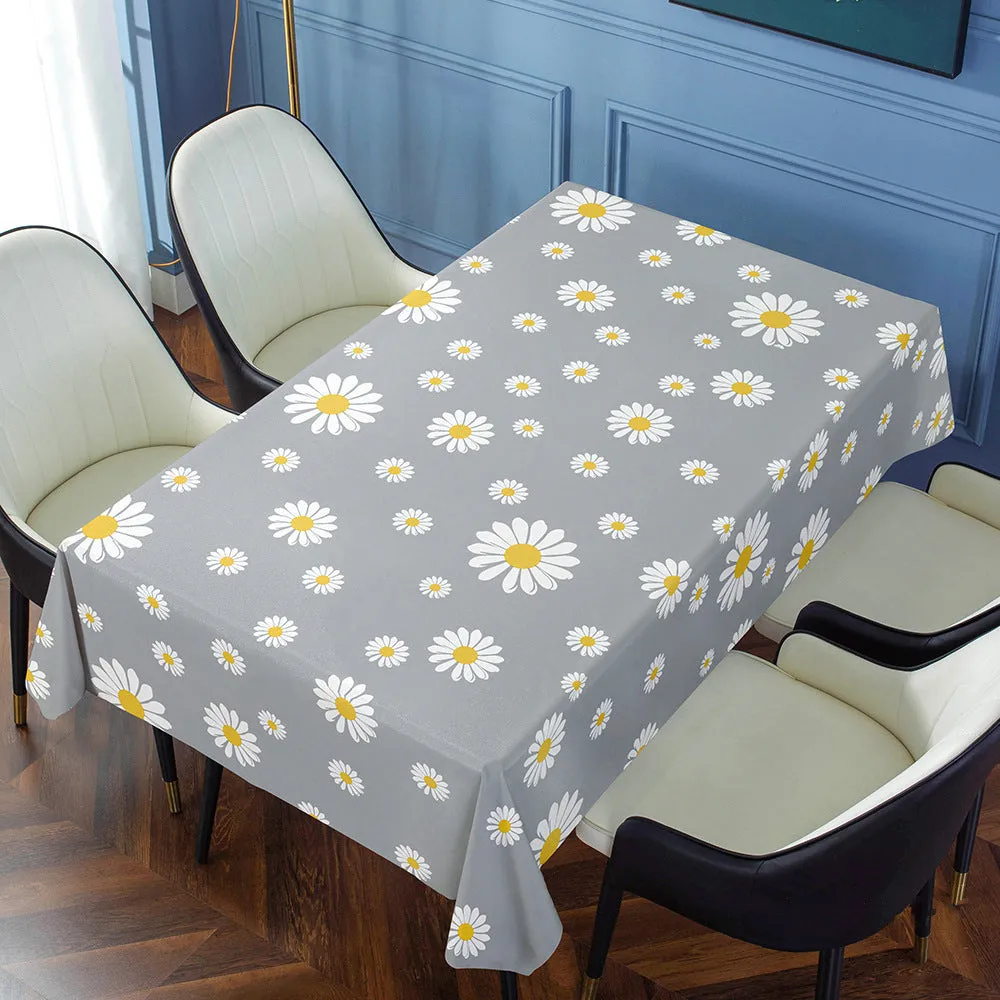 Rectangular PVC tablecloth with non-slip backing on a coffee table, showing geometric pattern