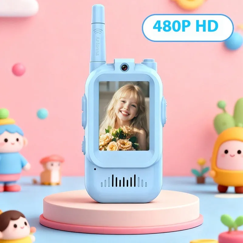 Two mini video walkie talkies for kids in pink and blue with 2.0 inch screen and charging cable