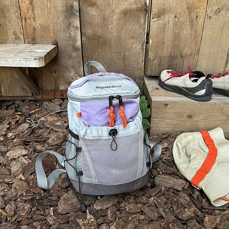 Waterproof nylon casual backpack in solid colour with curved shoulder straps and fold design details