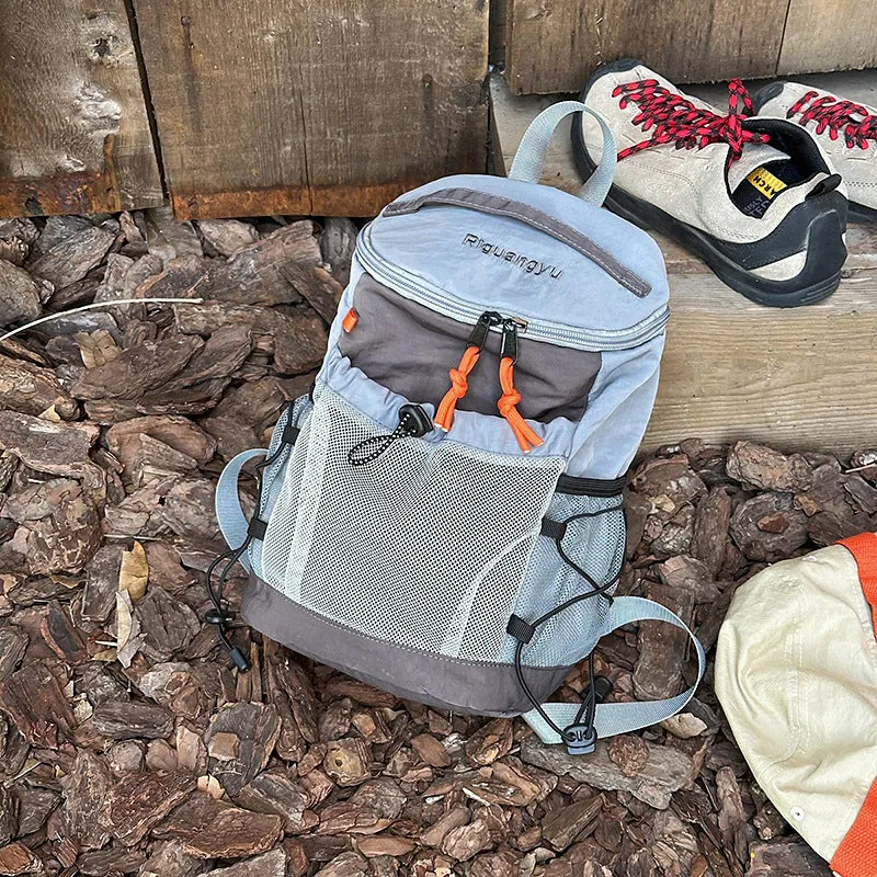 Waterproof nylon casual backpack in solid colour with curved shoulder straps and fold design details