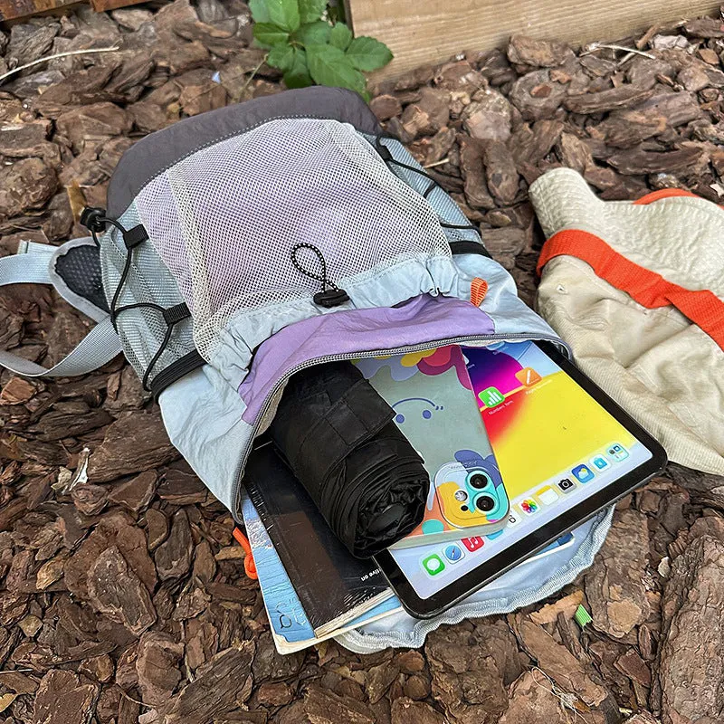 Waterproof nylon casual backpack in solid colour with curved shoulder straps and fold design details