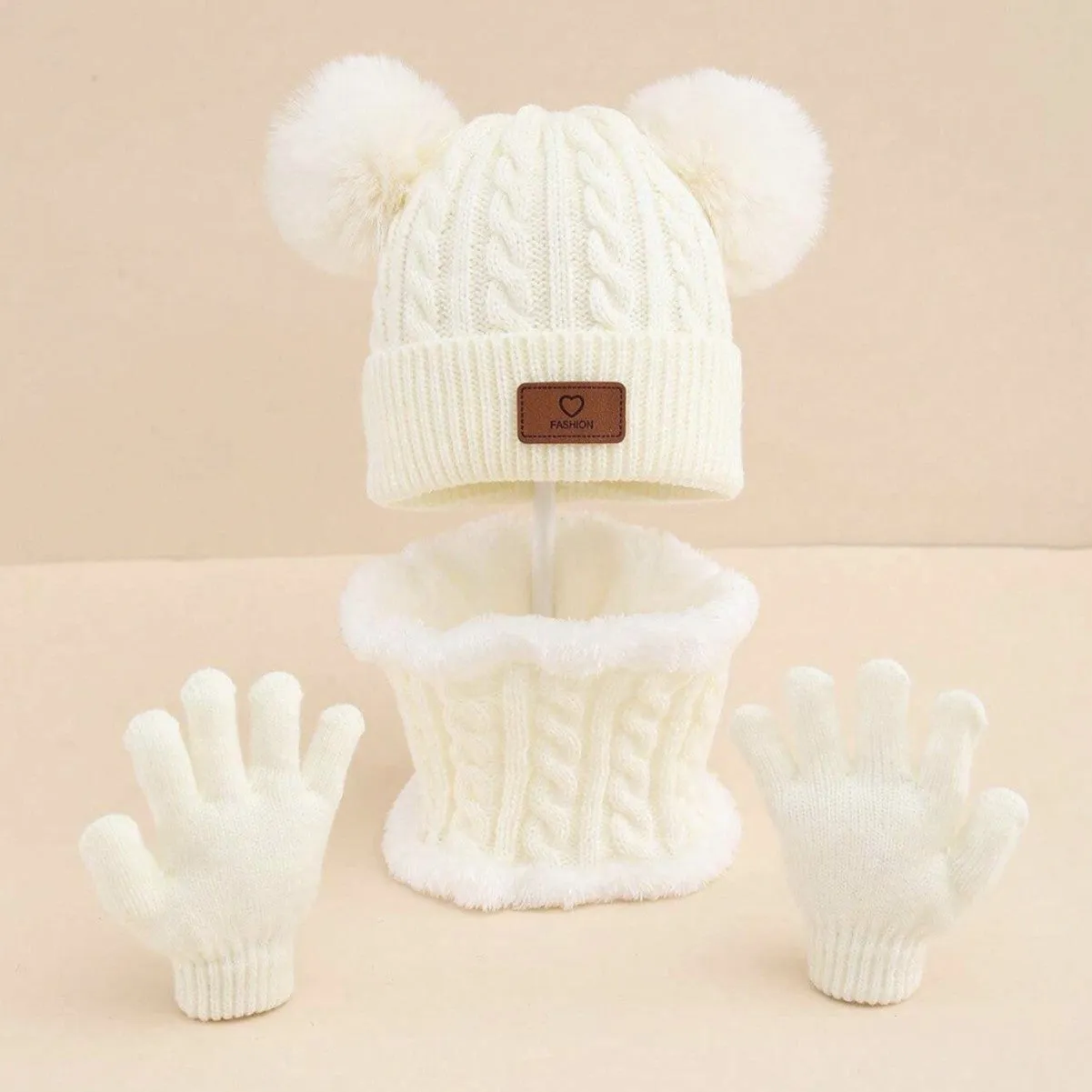 Children's three-piece acrylic knit winter set with dome crown hat and matching scarf and gloves in pink