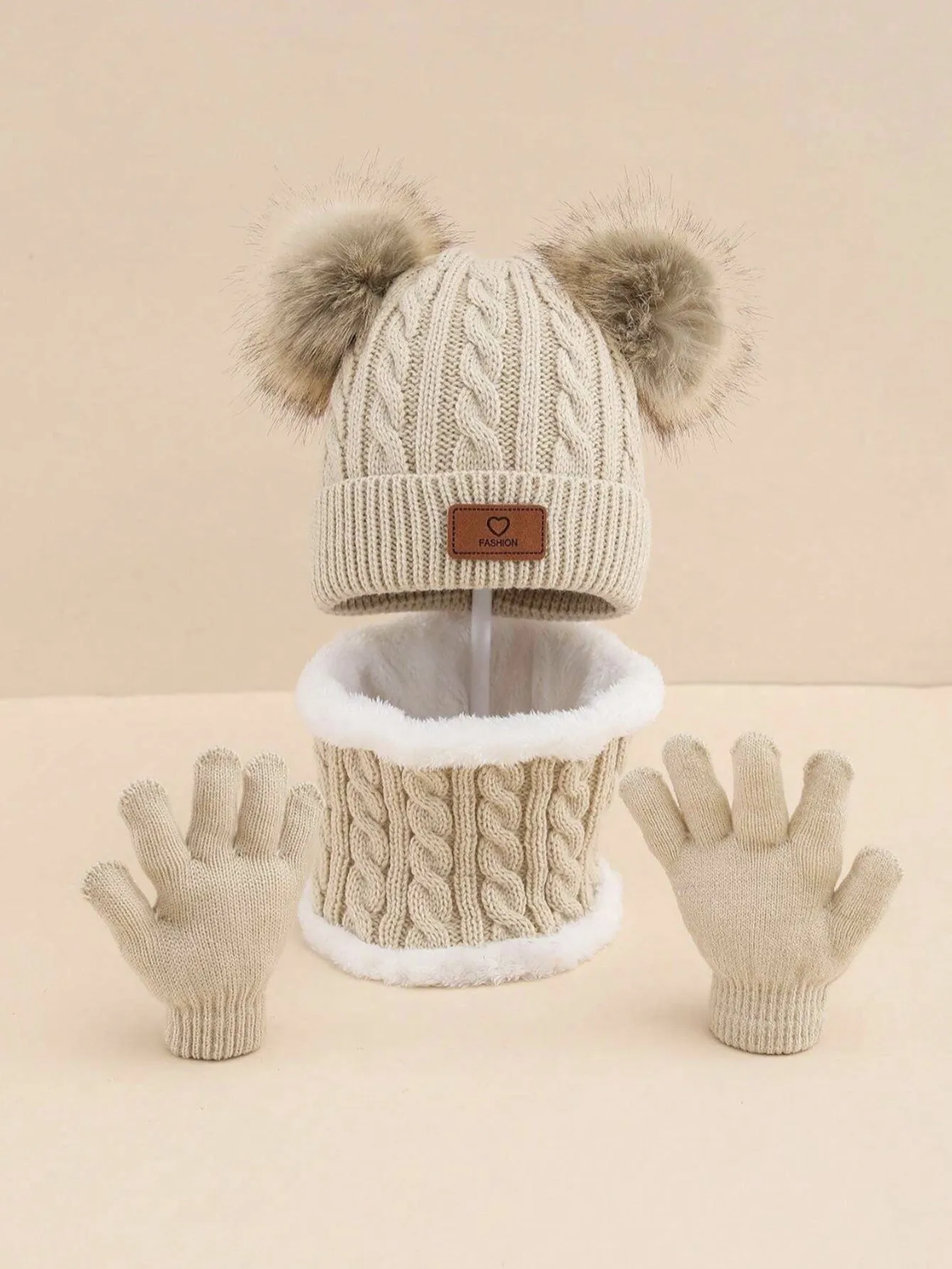 Children's three-piece acrylic knit winter set with dome crown hat and matching scarf and gloves in pink