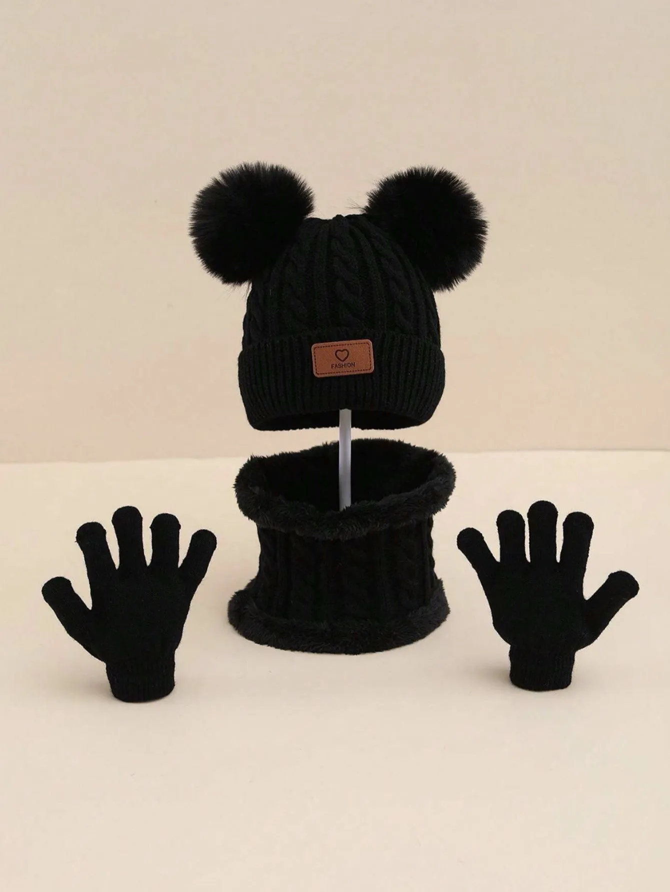Children's three-piece acrylic knit winter set with dome crown hat and matching scarf and gloves in pink