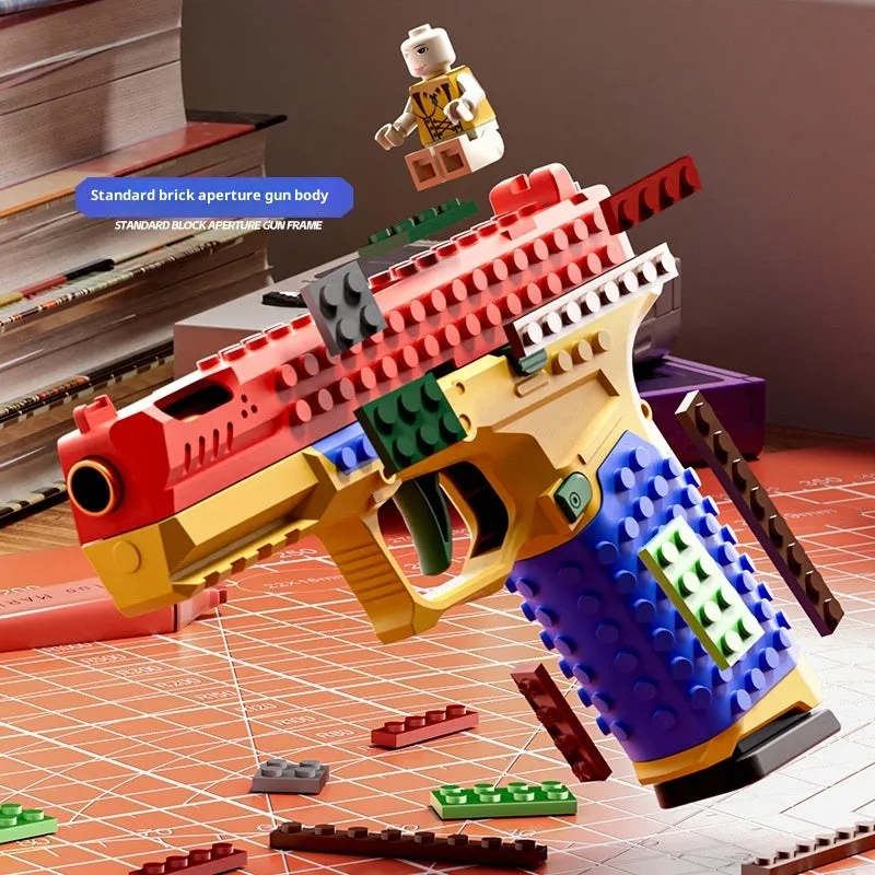 Glock G17 building block assembling gun on transparent stand with bullets and casings
