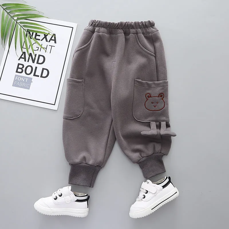 Boys' velvet sport pants in gray, green, and brown with elastic waistband and drawstring