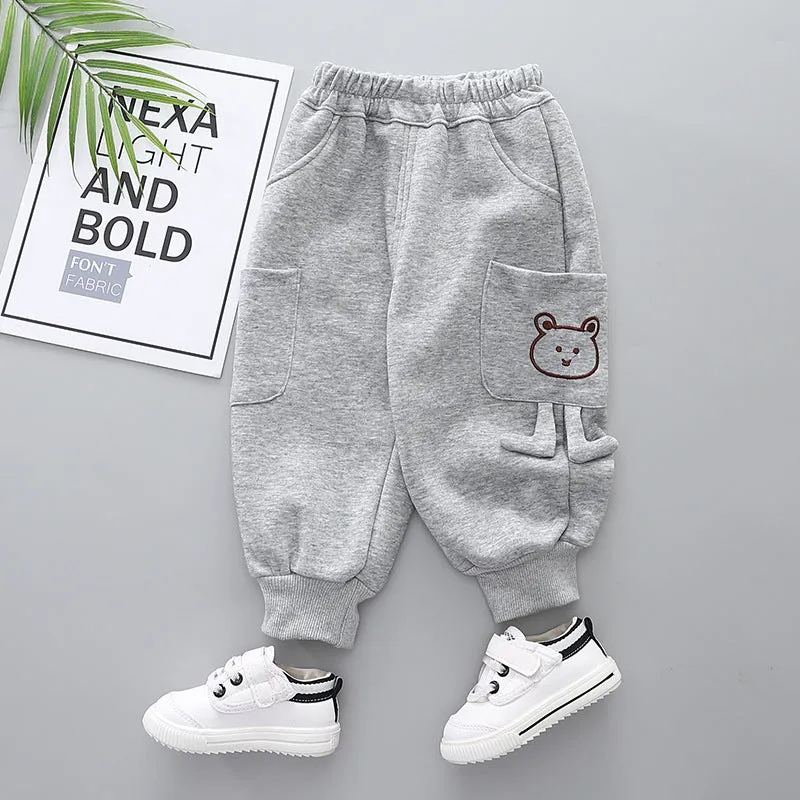 Boys' velvet sport pants in gray, green, and brown with elastic waistband and drawstring