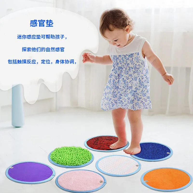 Autism children sensory pad recovery training set with 8 fabric pads on a flat surface