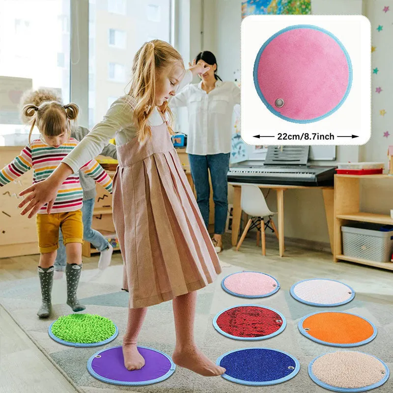 Autism children sensory pad recovery training set with 8 fabric pads on a flat surface