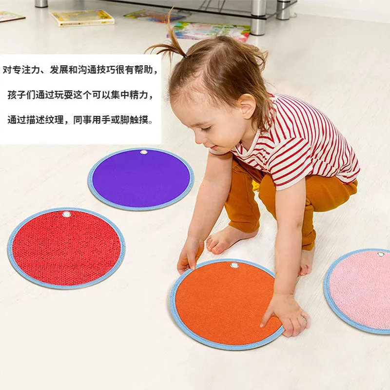 Autism children sensory pad recovery training set with 8 fabric pads on a flat surface