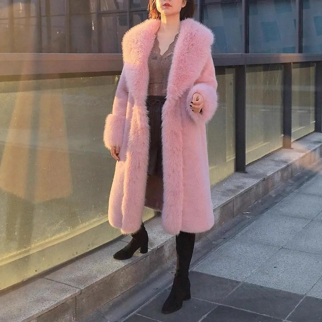A grey women's thick faux rabbit fur coat with a fur collar, shown mid-length.