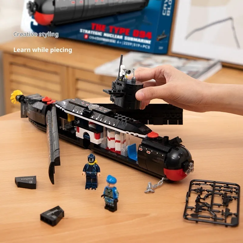 Military building blocks nuclear-powered submarine model assembled from small plastic bricks, colour box packaging, for kids aged 4 to 6