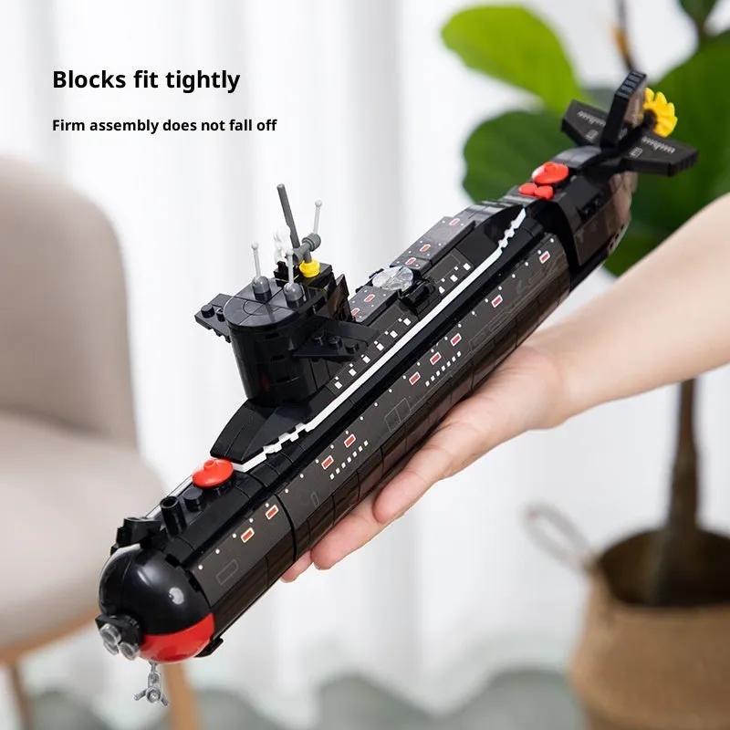 Military building blocks nuclear-powered submarine model assembled from small plastic bricks, colour box packaging, for kids aged 4 to 6