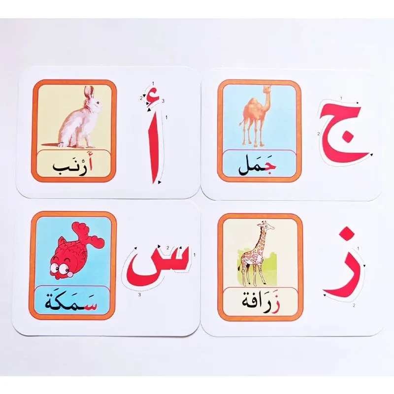 28 paper children's recognition literacy cards covering English and number learning laid out on a flat surface